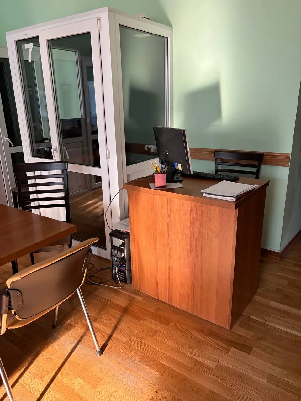 Administrator desk beside the booth area